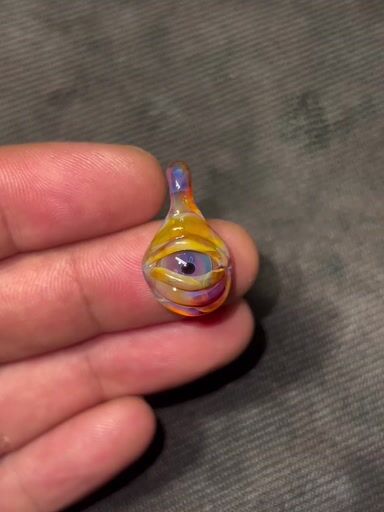 Preview pic of Mini eye pendant made with amber purple