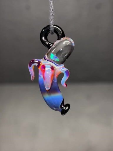 Preview pic of Amber purple/Opal banana pendant