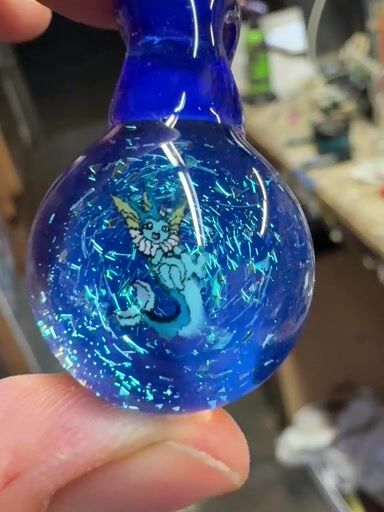Preview pic of Vaporeon and dichro pendy