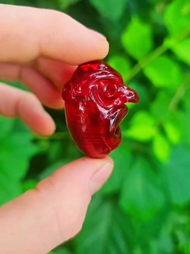 Preview pic of Red with rage hollow face pendant