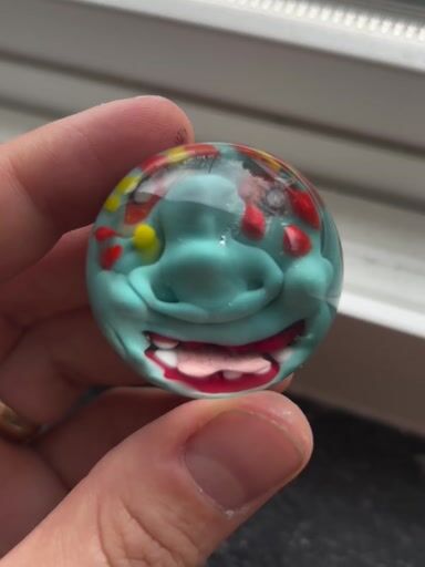 Preview pic of Blue smushed face marble