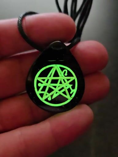 Preview pic of Necronomicon Layered Glow Pendant
