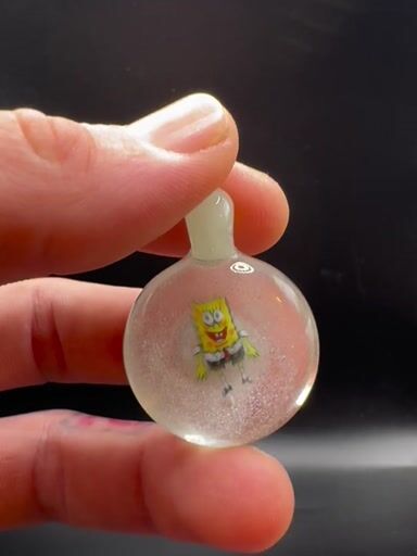 Preview pic of SpongeBob/Gary Glow in the dark pendant