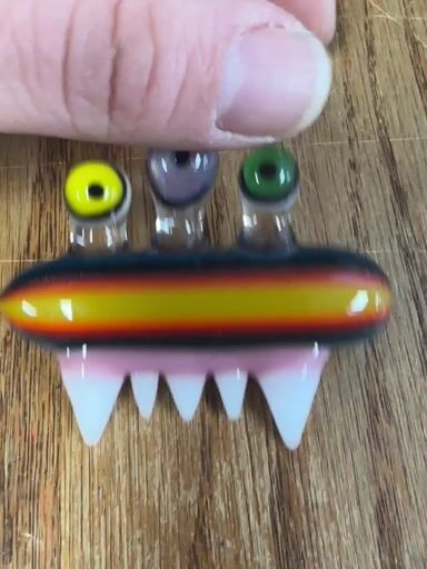 Preview pic of Mcfly glass 3 eyed monster series pendant signed and dated rare new old stock 2016